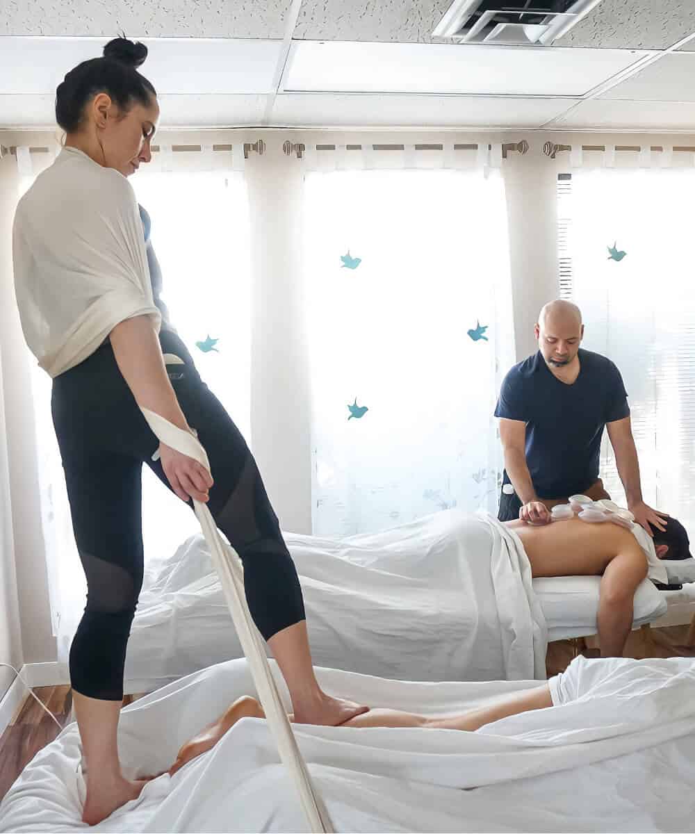 A couple receives a customized massage for two at Whole Being Massage in Boise, Idaho